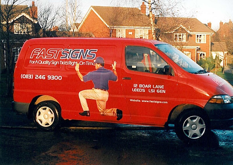 An image of the first red FASTSIGNS van.